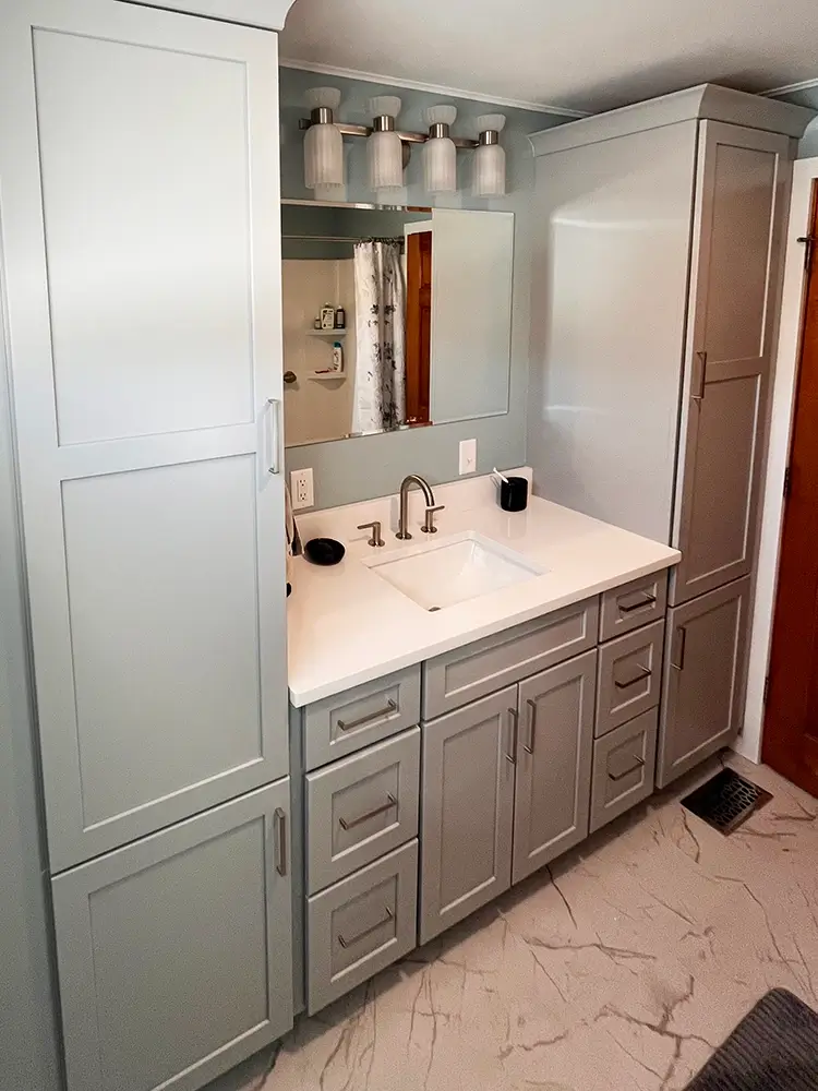Newly remodeled bathroom vanity with side closet storage